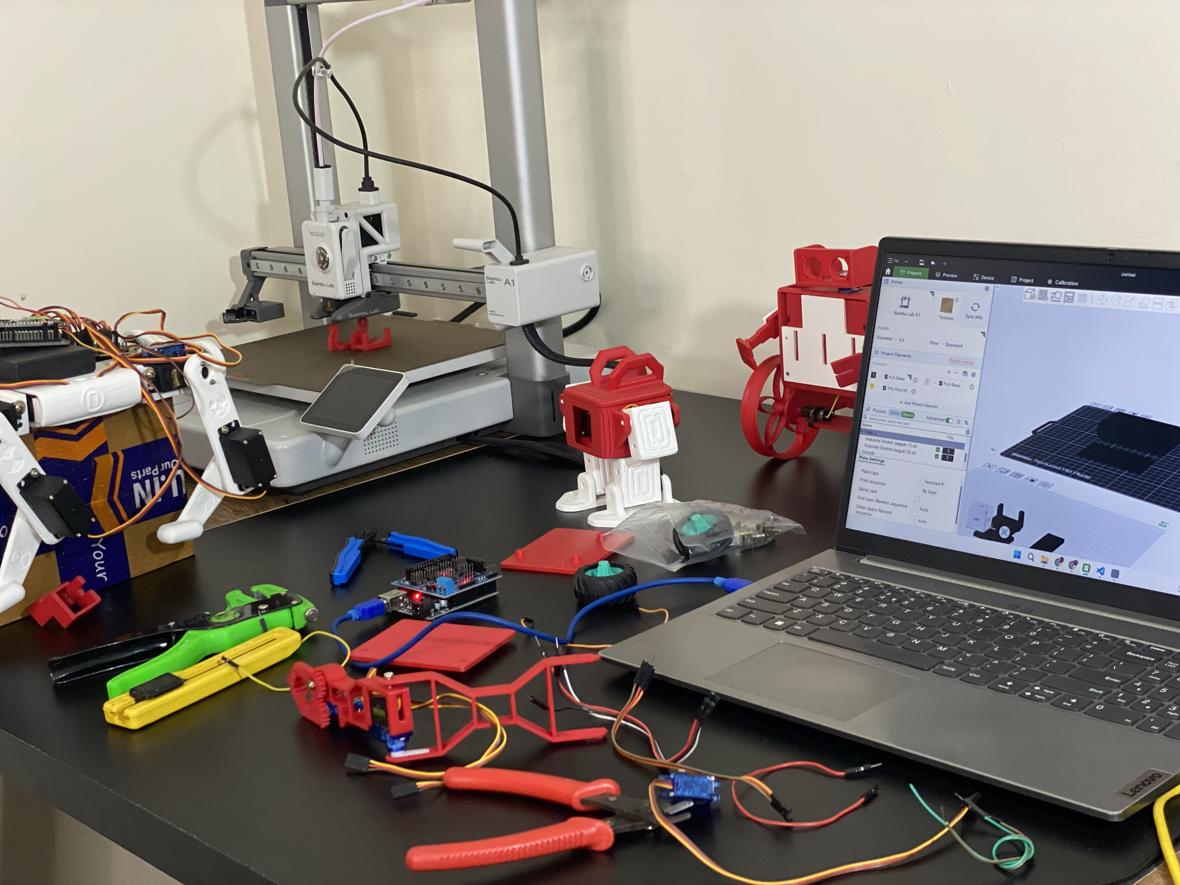 Students assembling custom robotics projects